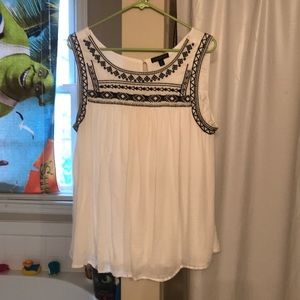 Embellished swing tank